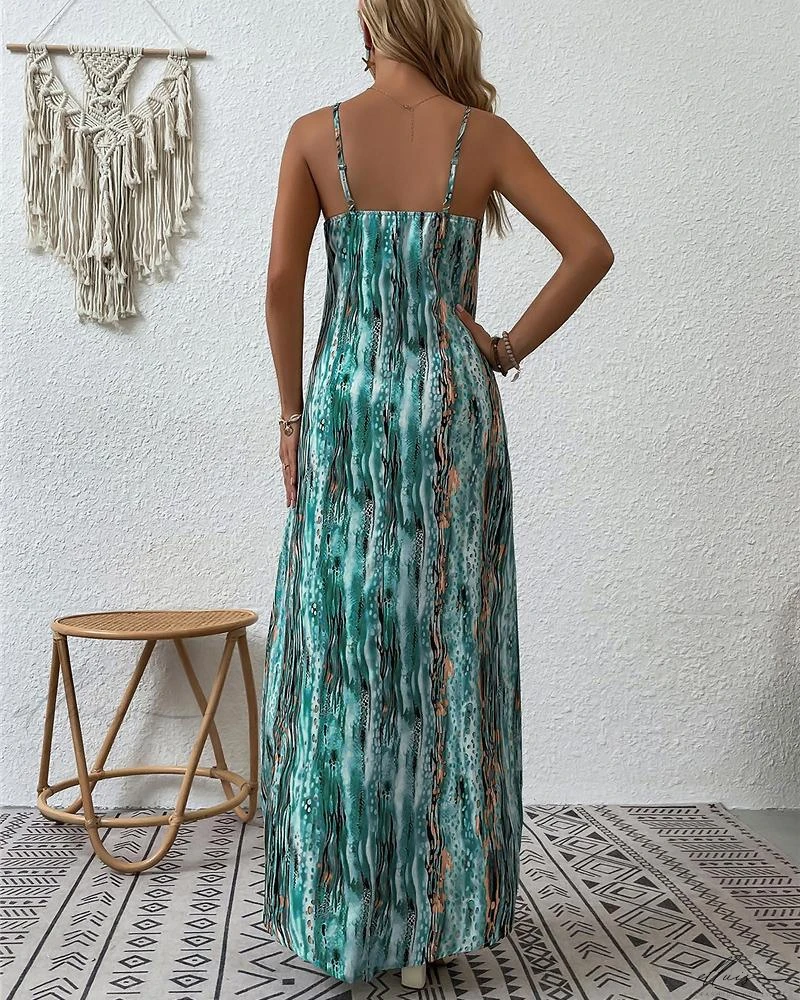 Rebecca – Schickes Maxikleid mit Spaghettiträgern und abstraktem Druck